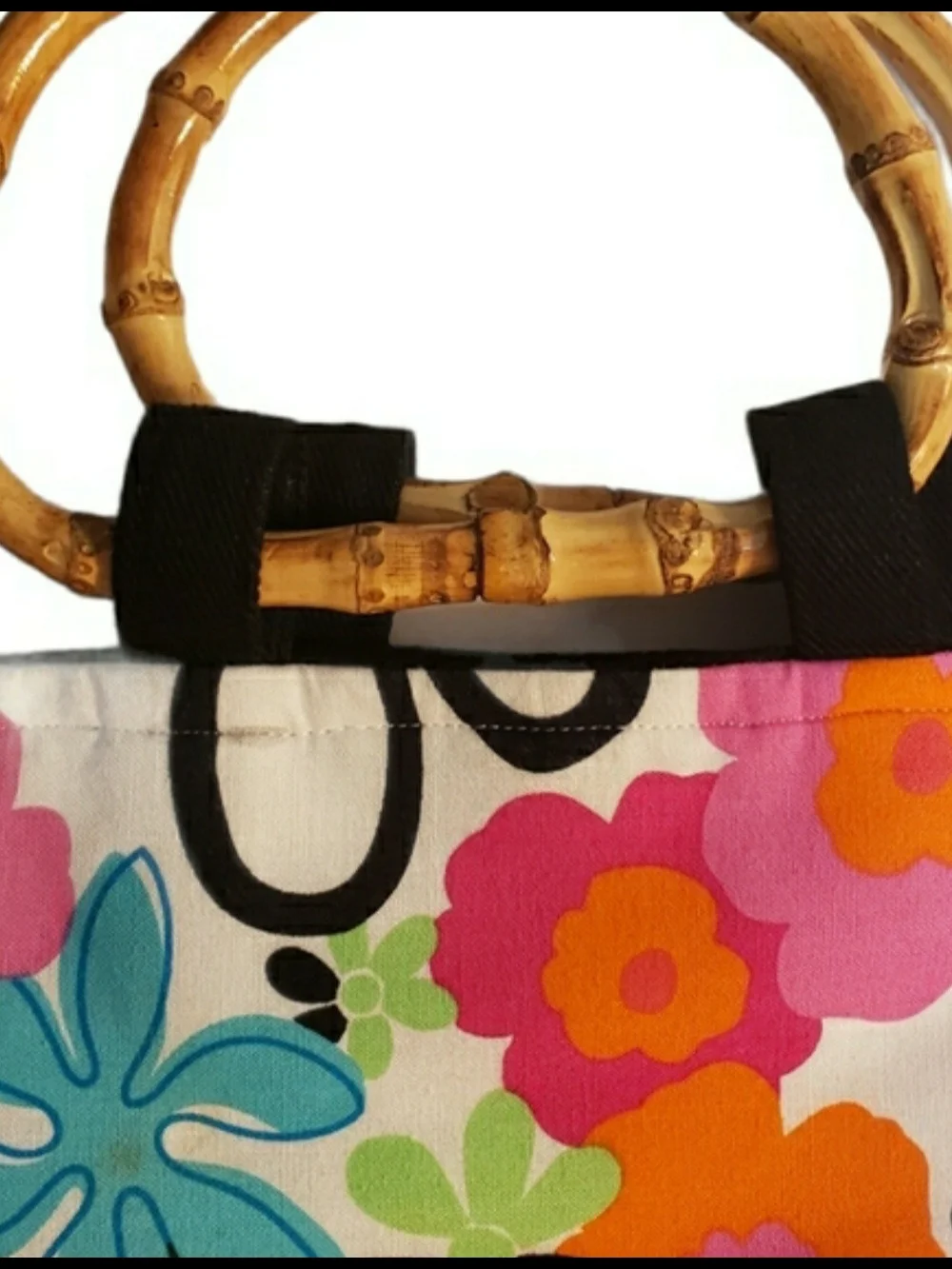 Thirty-One purse, which features a distinctive retro floral pattern. Med